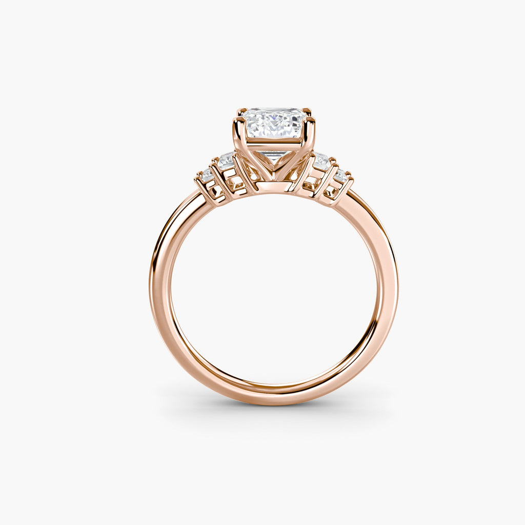 engagement-rings__baguette-accent-solitaire__shape-emerald__gold-rose__03_front.jpg