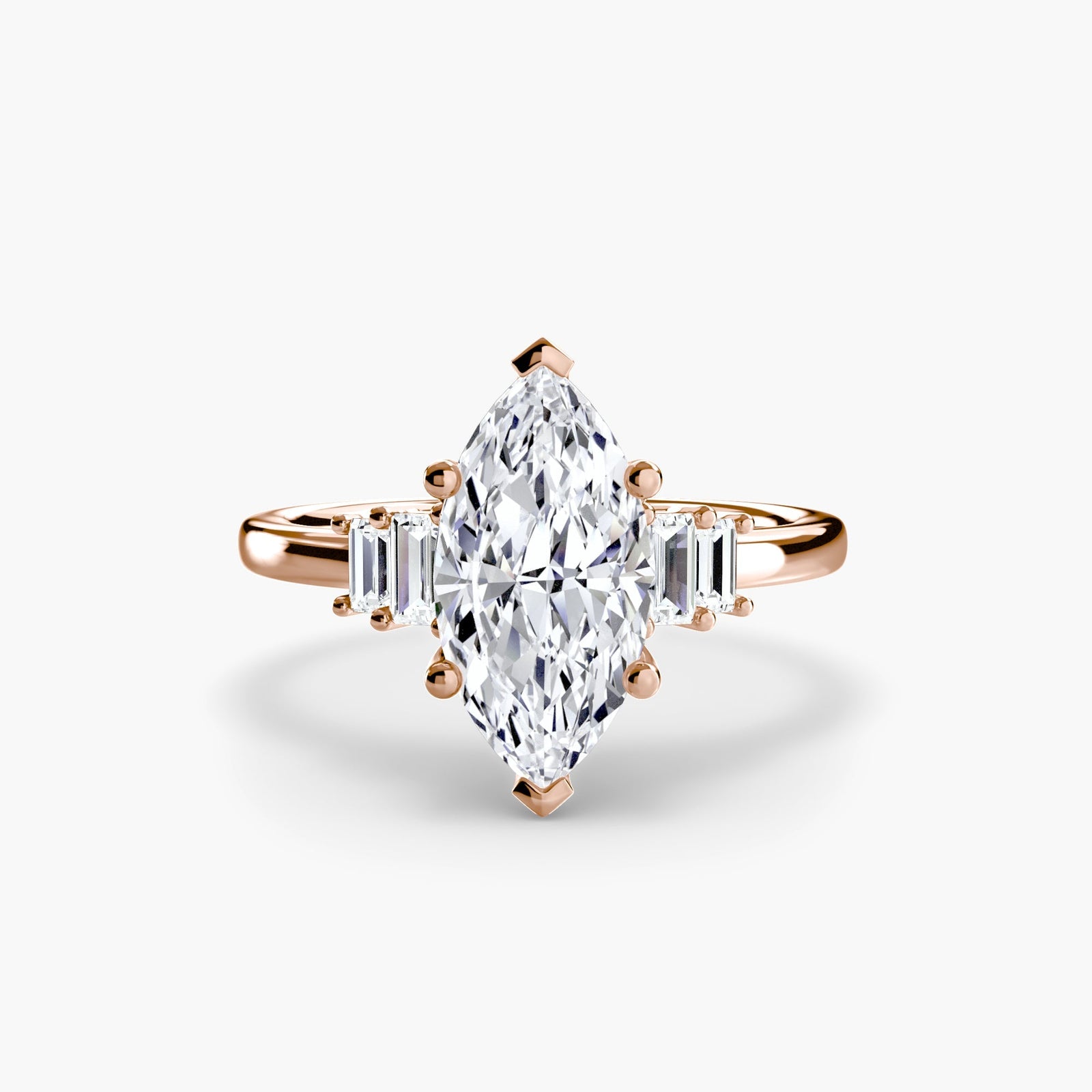 engagement-rings__baguette-accent-solitaire__shape-marquise__gold-rose__01_down.jpg