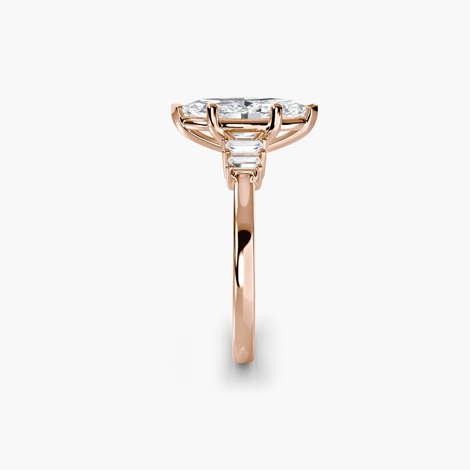 engagement-rings__baguette-accent-solitaire__shape-marquise__gold-rose__02_side.jpg