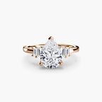 engagement-rings__baguette-accent-solitaire__shape-pear__gold-rose__01_down.jpg