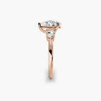 engagement-rings__baguette-accent-solitaire__shape-pear__gold-rose__02_side.jpg