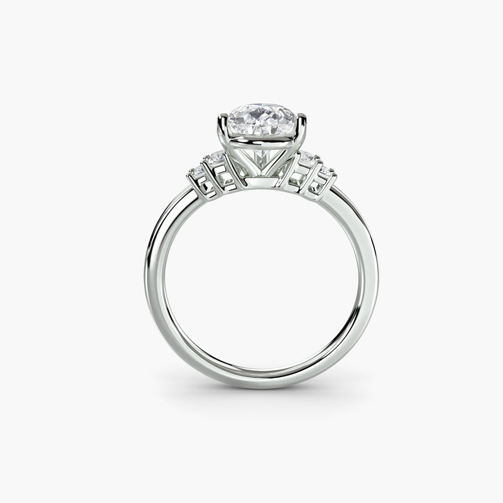engagement-rings__baguette-accent-solitaire__shape-pear__gold-white__03_front.jpg
