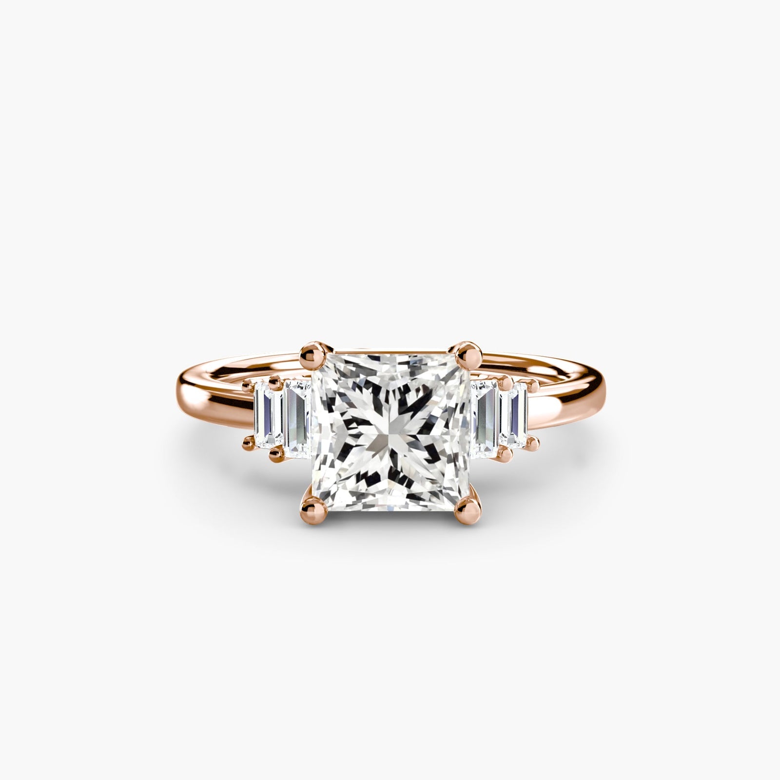 engagement-rings__baguette-accent-solitaire__shape-princess__gold-rose__01_down.jpg