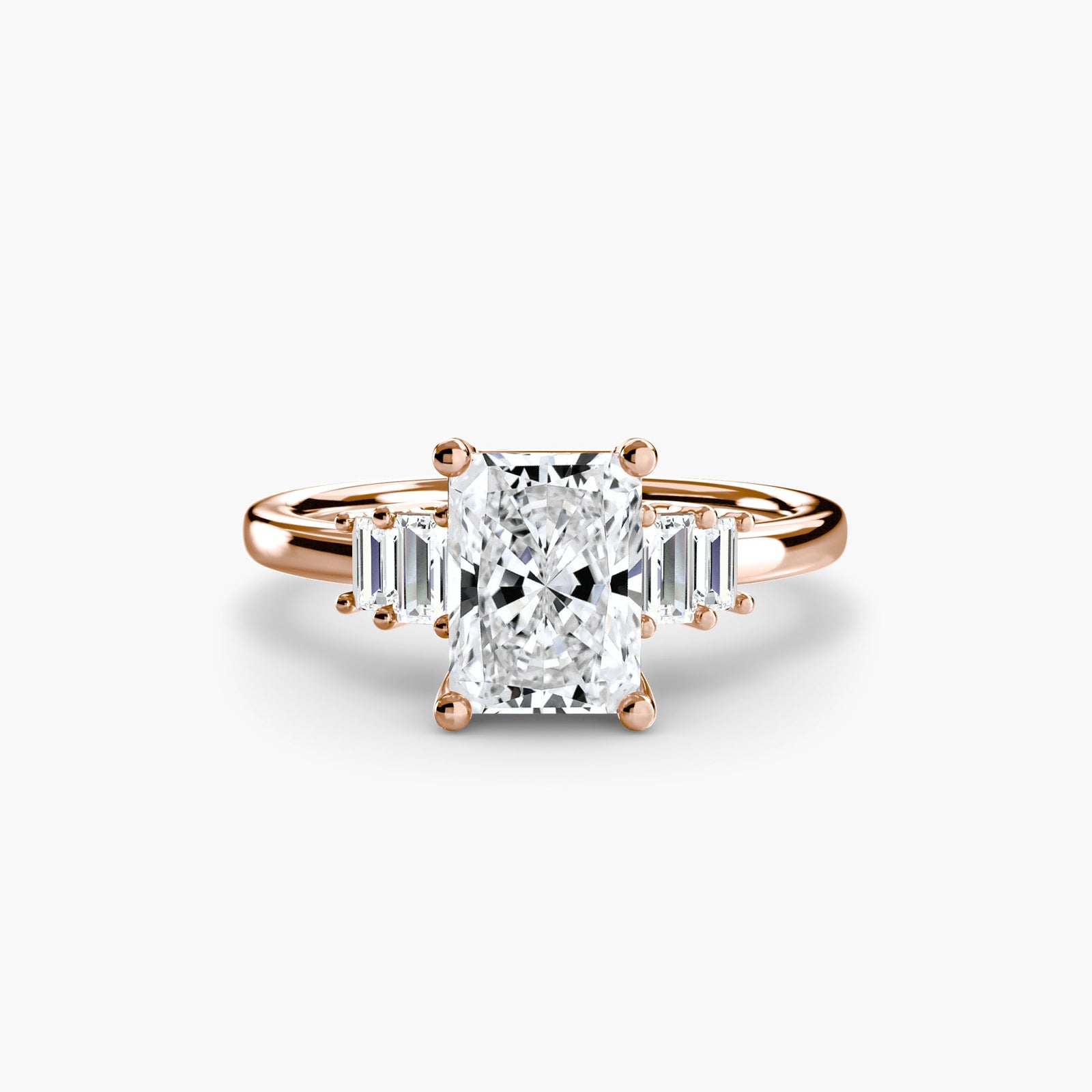engagement-rings__baguette-accent-solitaire__shape-radiant__gold-rose__01_down.jpg