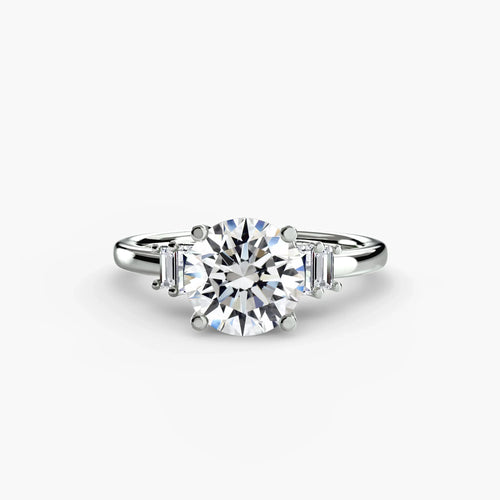 engagement-rings__baguette-accent-solitaire__shape-round__gold-white__01_down.webp