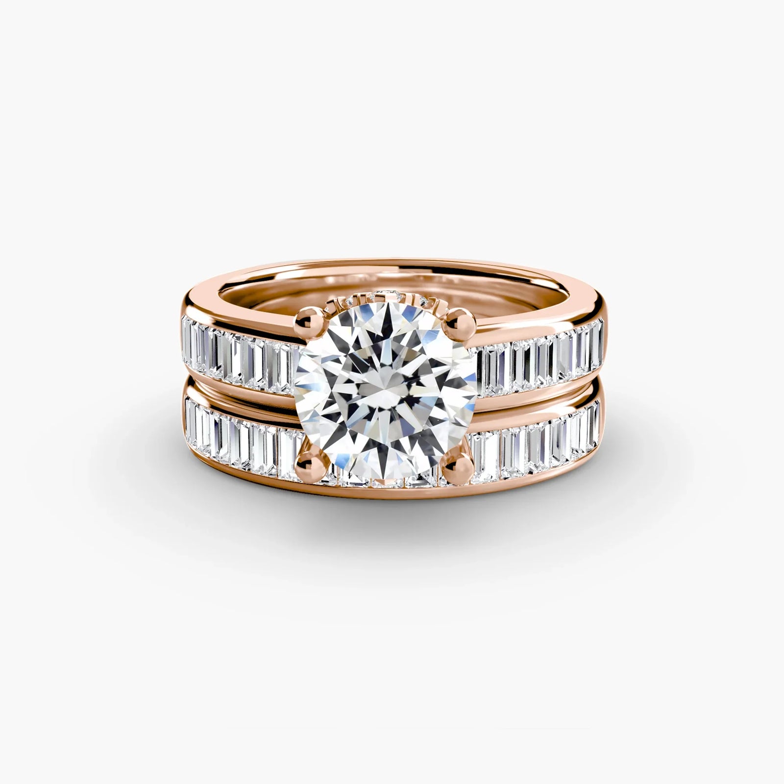 engagement-rings__baguette-channel-solitaire__shape-round__gold-rose__01_down.webp