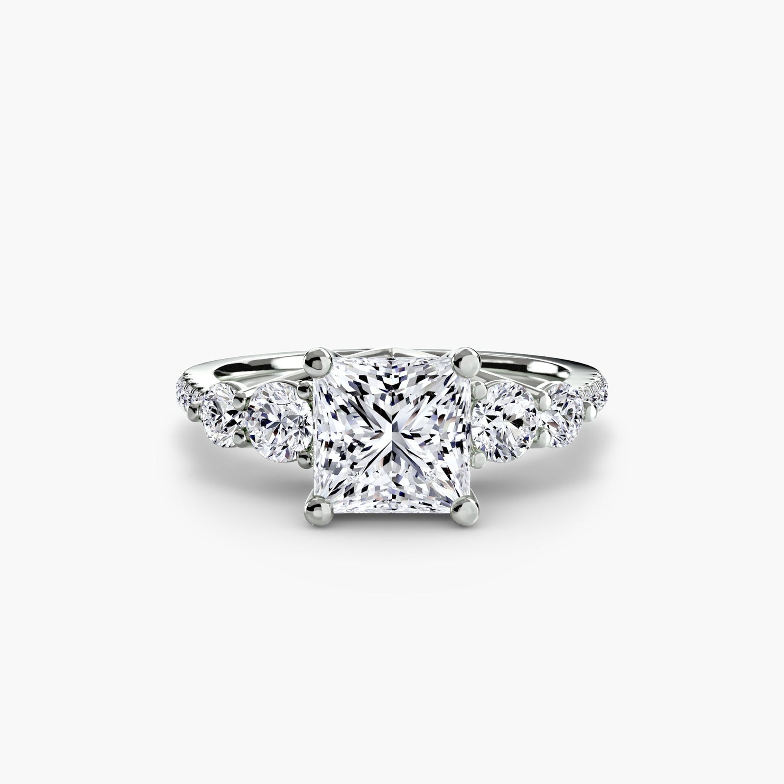 engagement-rings__five-stone-ring-with-pavé-band__shape-princess__gold-white__01_down.jpg