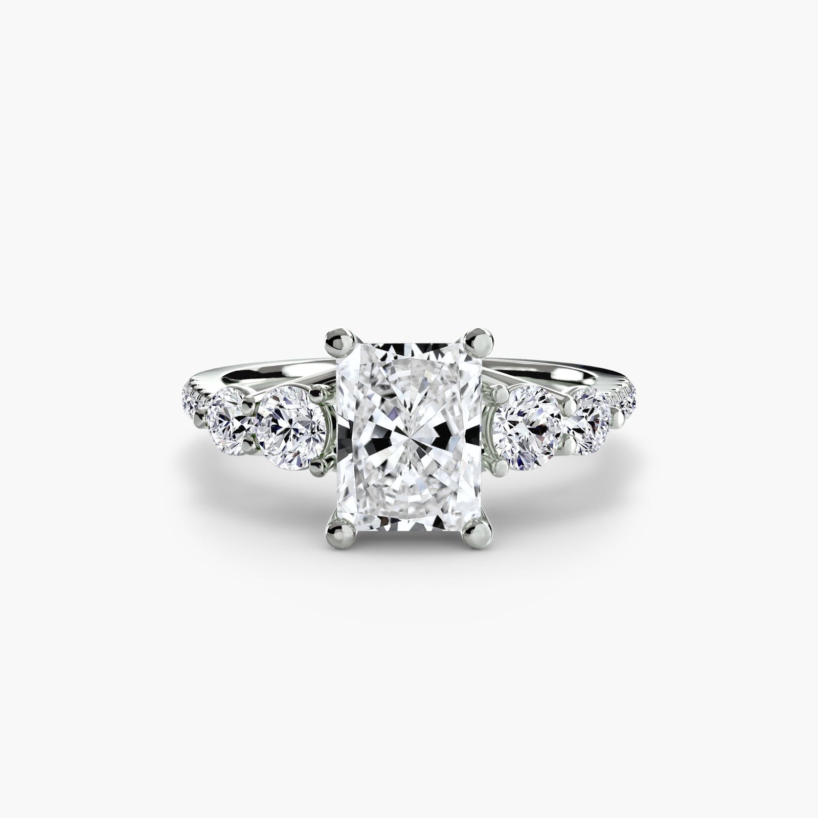 engagement-rings__five-stone-ring-with-pavé-band__shape-radiant__gold-white__01_down.jpg