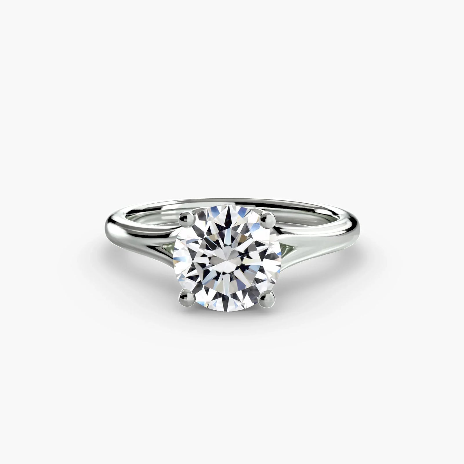 engagement-rings__solitaire-ring-4__shape-round__gold-white__01_down.webp