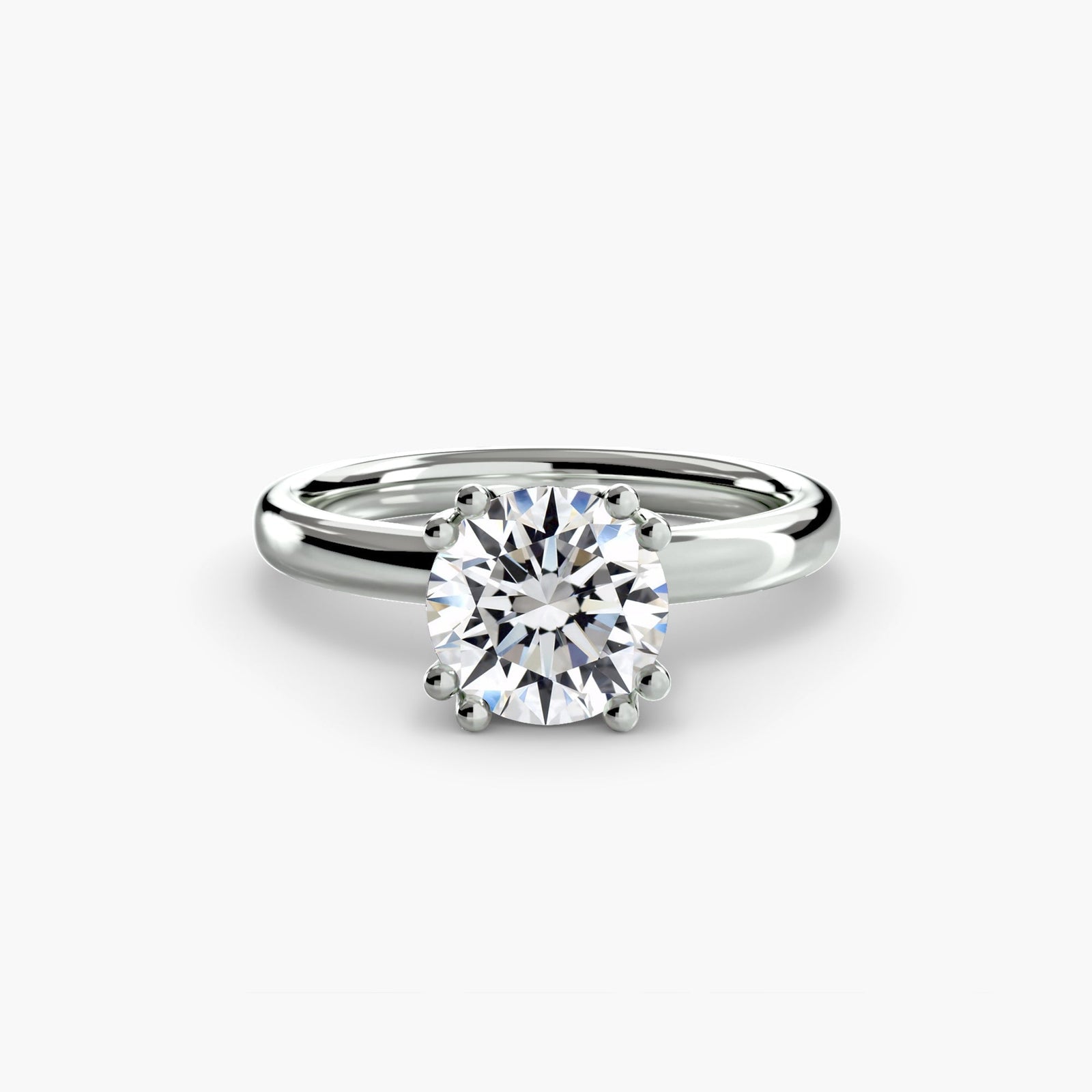 engagement-rings__solitaire-ring-5__shape-round__gold-white__01_down.jpg