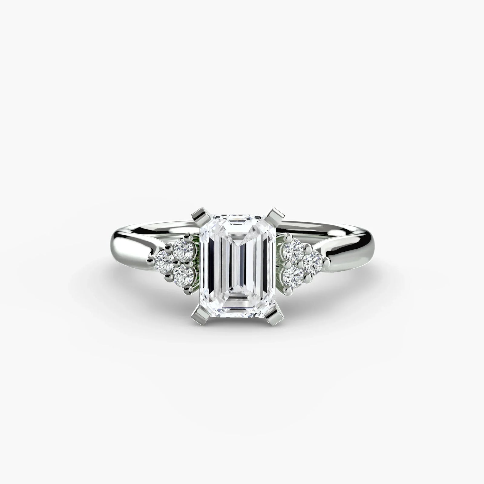 engagement-rings__solitaire-with-cluster-shoulders-2__shape-emerald__gold-white__01_down.webp