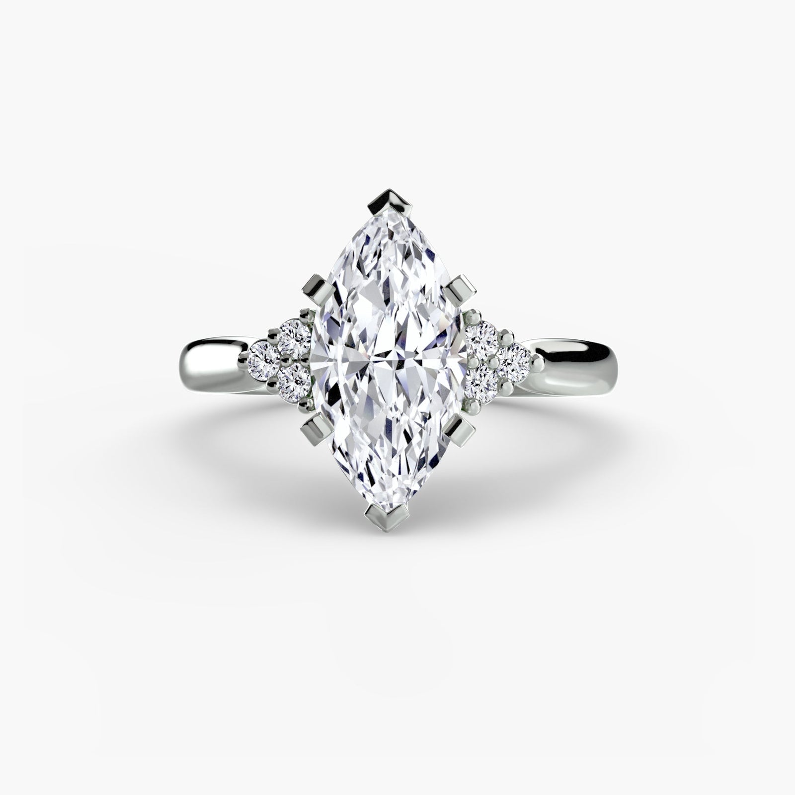 engagement-rings__solitaire-with-cluster-shoulders-2__shape-marquise__gold-white__01_down.jpg