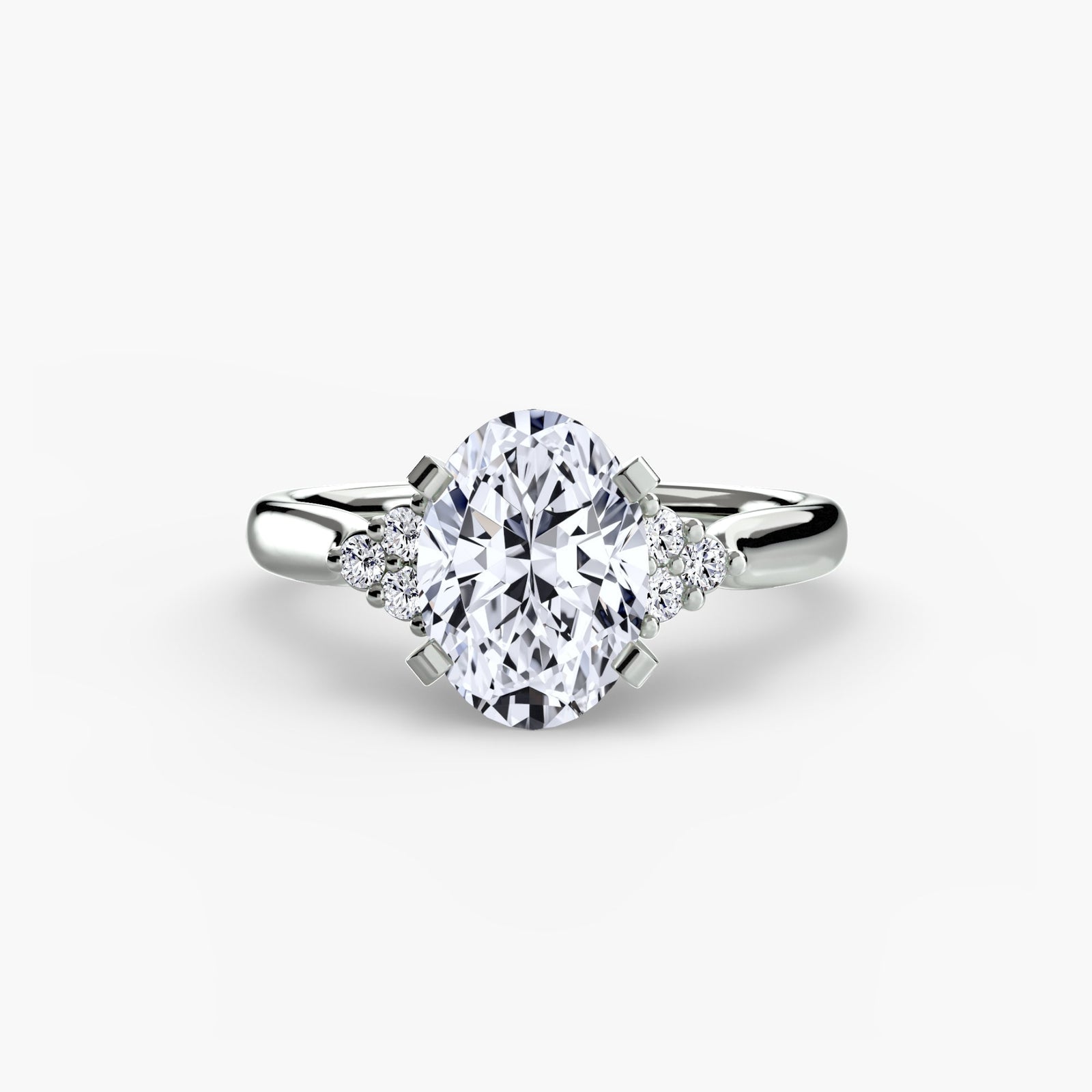 engagement-rings__solitaire-with-cluster-shoulders-2__shape-oval__gold-white__01_down.jpg