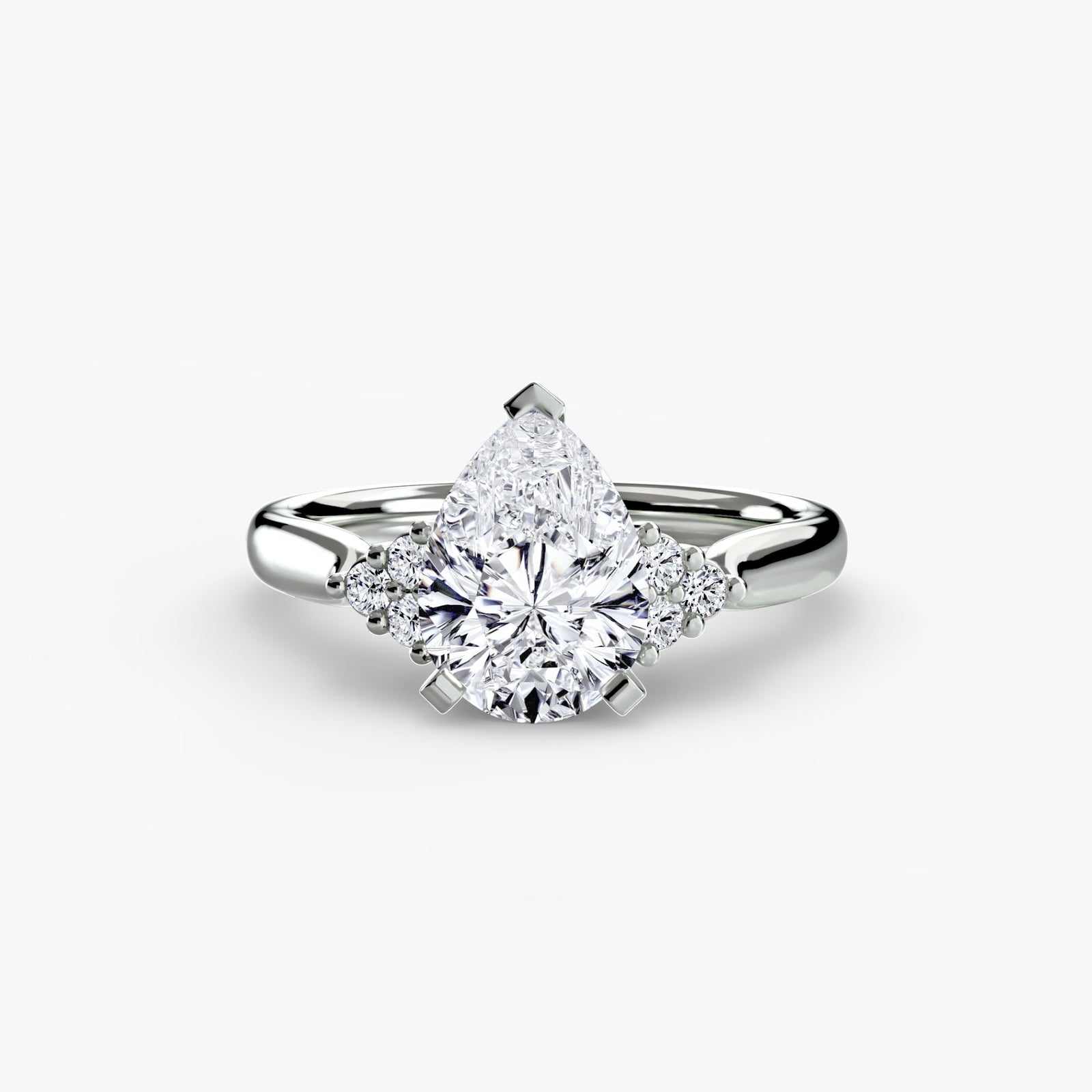 engagement-rings__solitaire-with-cluster-shoulders-2__shape-pear__gold-white__01_down.jpg