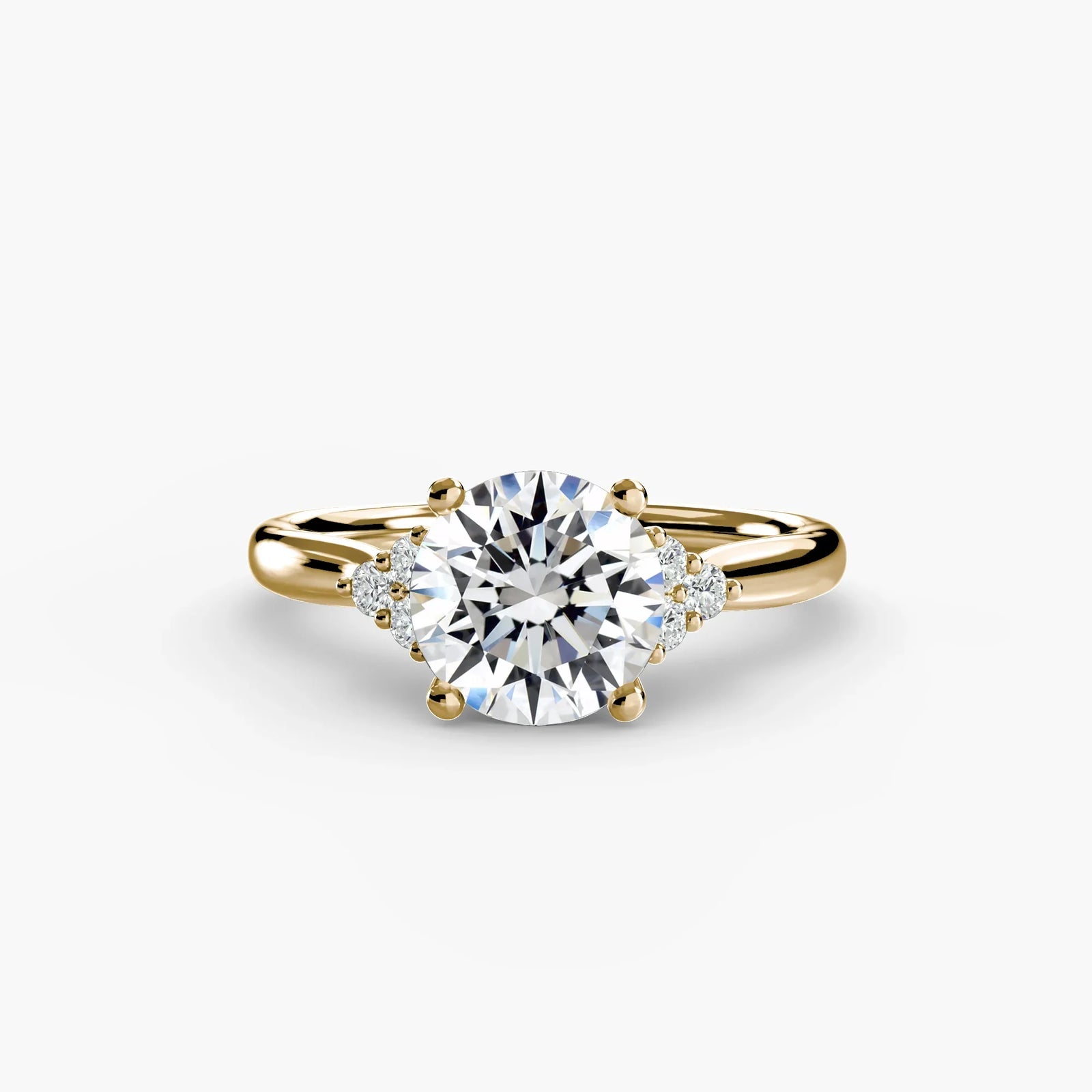 engagement-rings__solitaire-with-cluster-shoulders__shape-round__gold-gold__01_down.webp