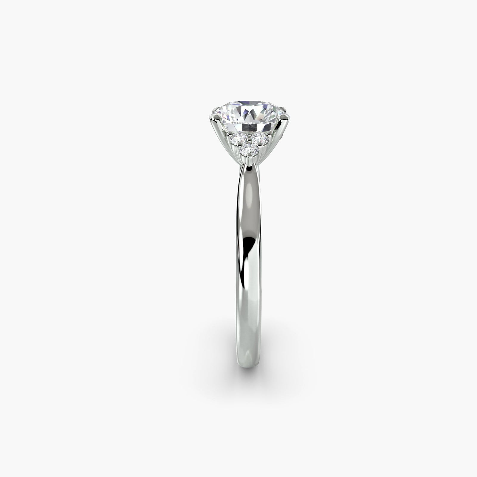 engagement-rings__solitaire-with-cluster-shoulders__shape-round__gold-white__02_side.jpg