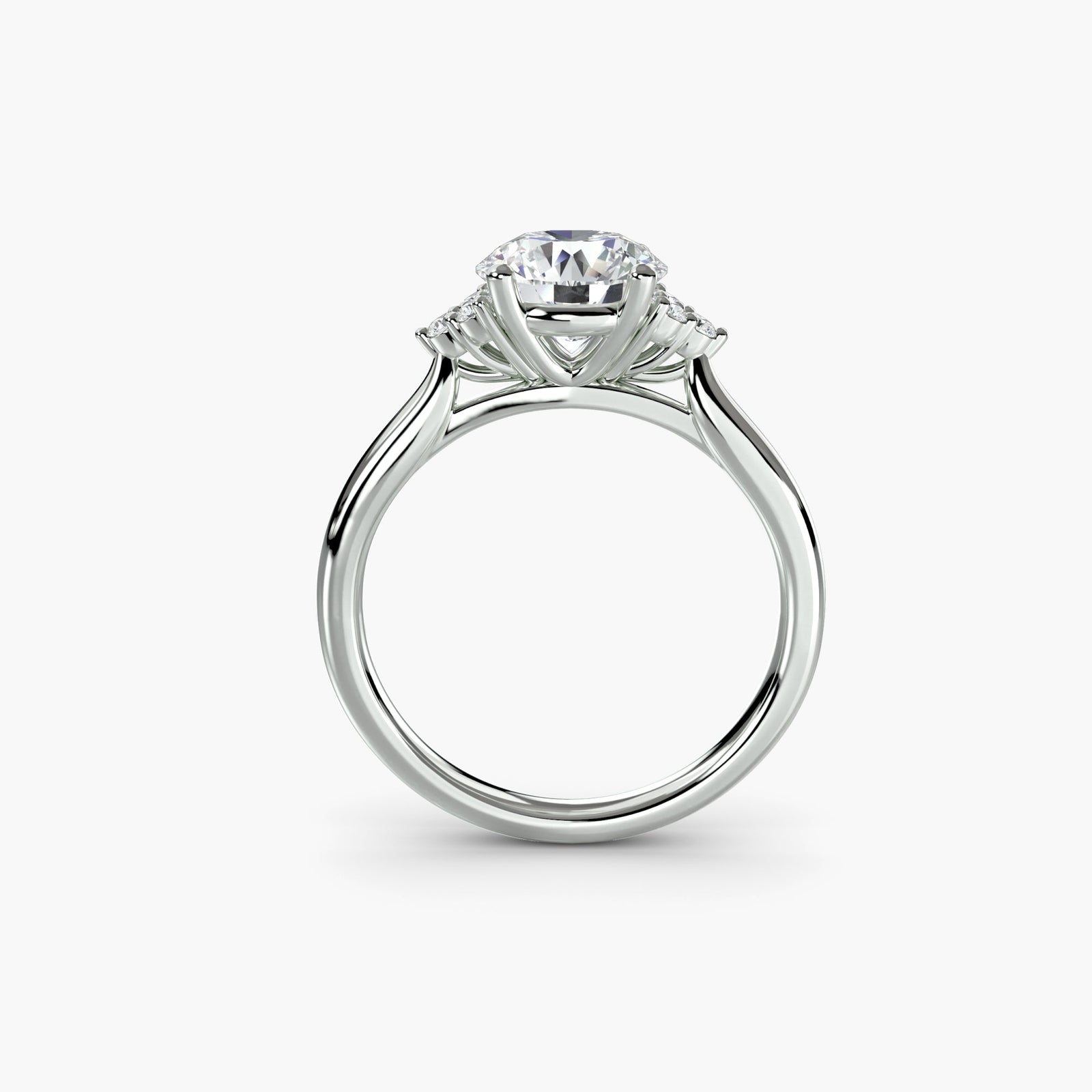 engagement-rings__solitaire-with-cluster-shoulders__shape-round__gold-white__03_front.jpg