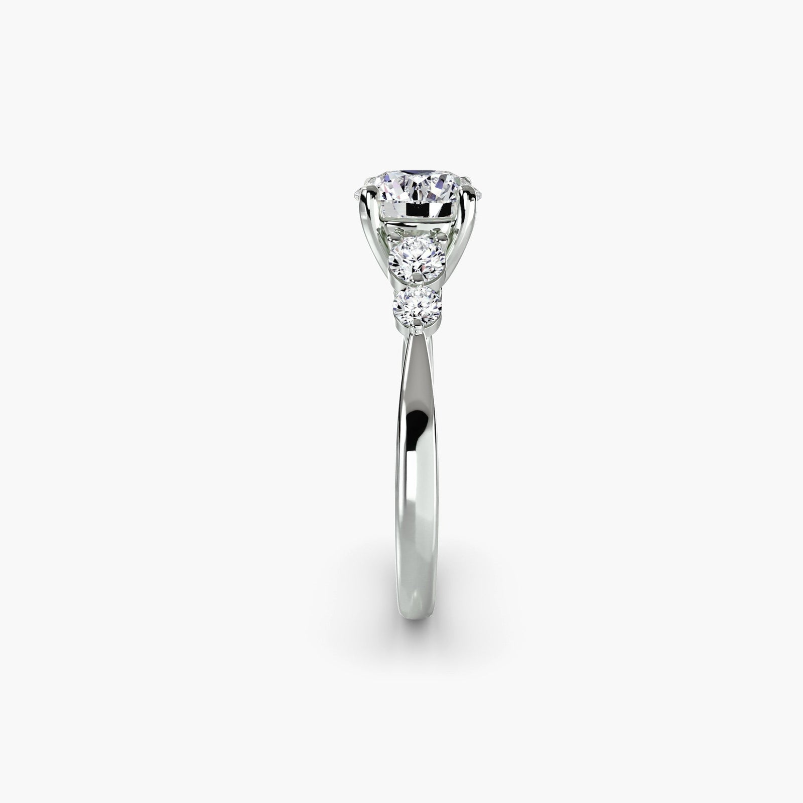 engagement-rings__solitaire-with-shoulder-accents-2__shape-round__gold-white__02_side.jpg