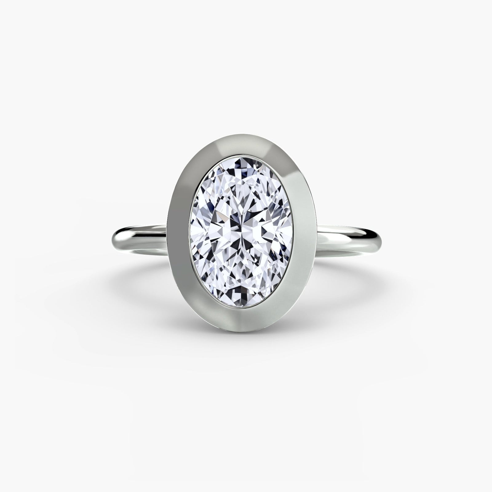 engagement-rings__the-bezel-set-solitaire__shape-oval__gold-white__01_down.jpg