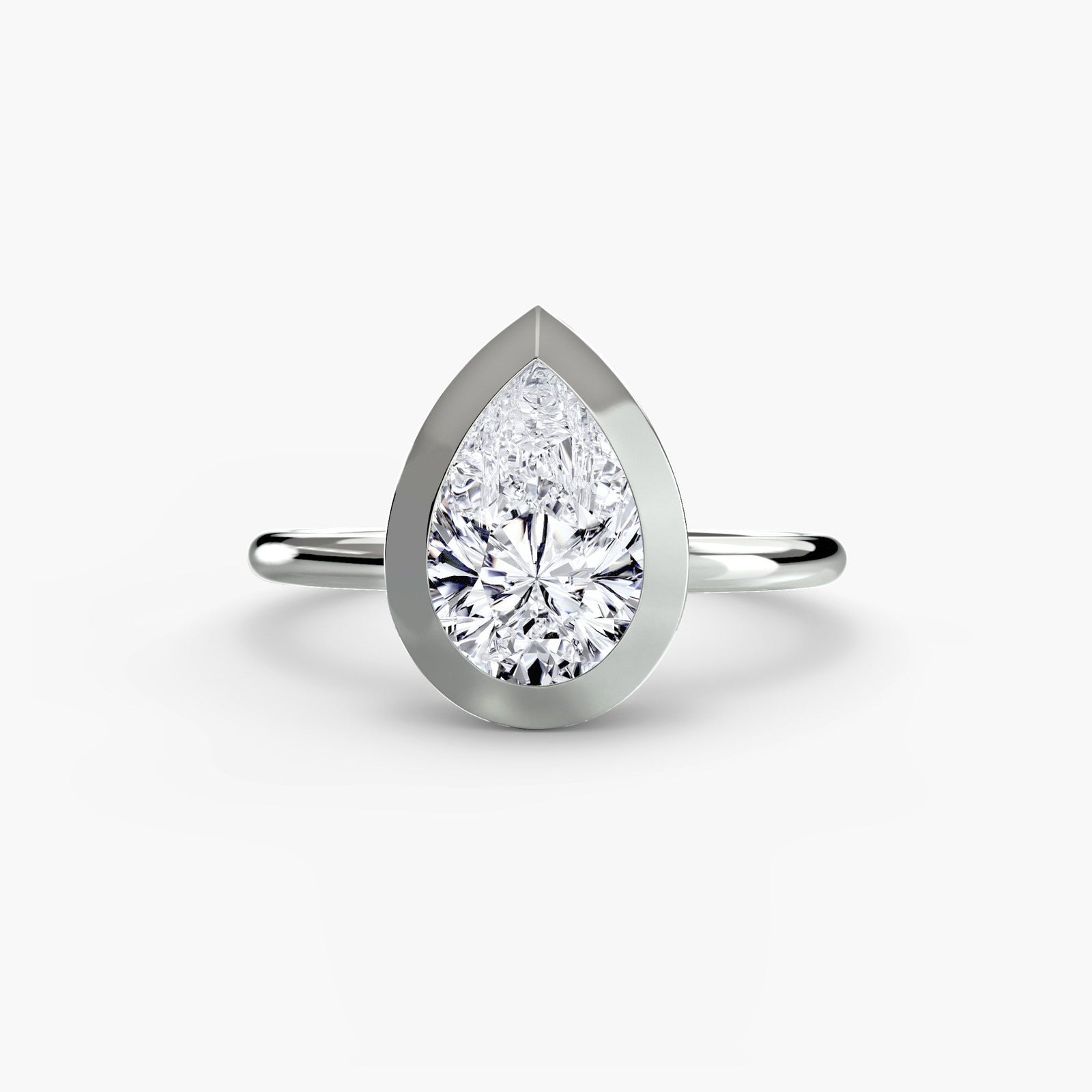 engagement-rings__the-bezel-set-solitaire__shape-pear__gold-white__01_down.jpg