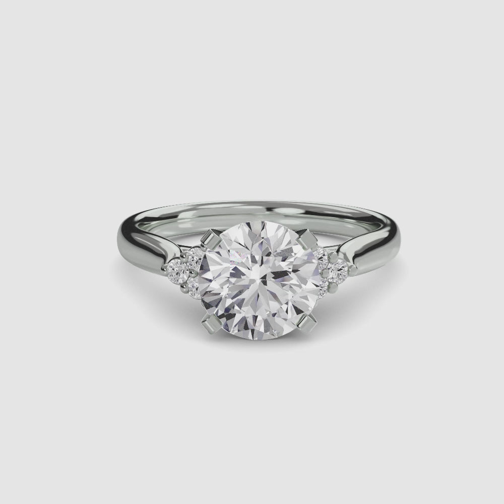 engagement-rings__solitaire-with-cluster-shoulders-2__shape-round__gold-white__00_video.mp4