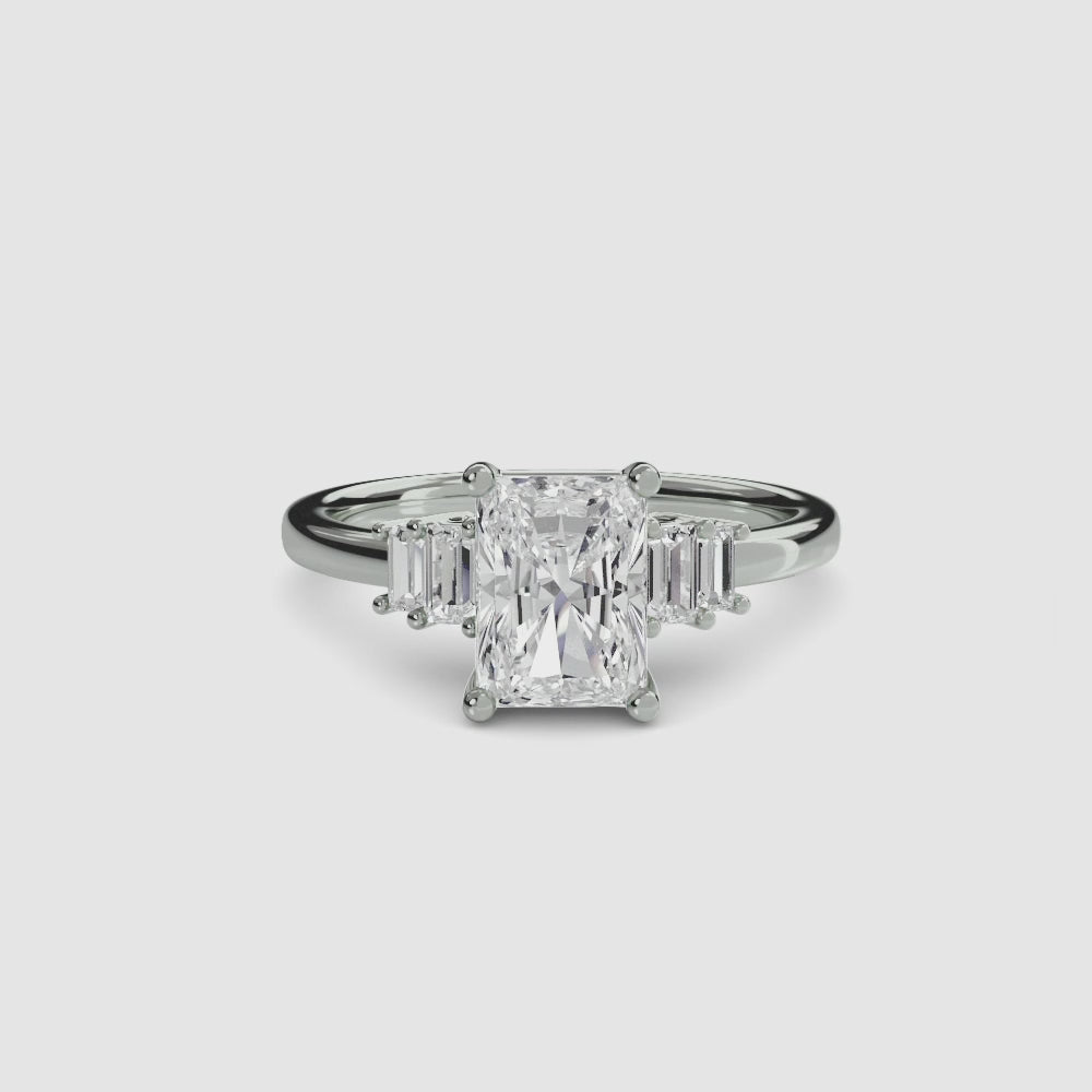 engagement-rings__baguette-accent-solitaire__shape-radiant__gold-white__00_video.mp4