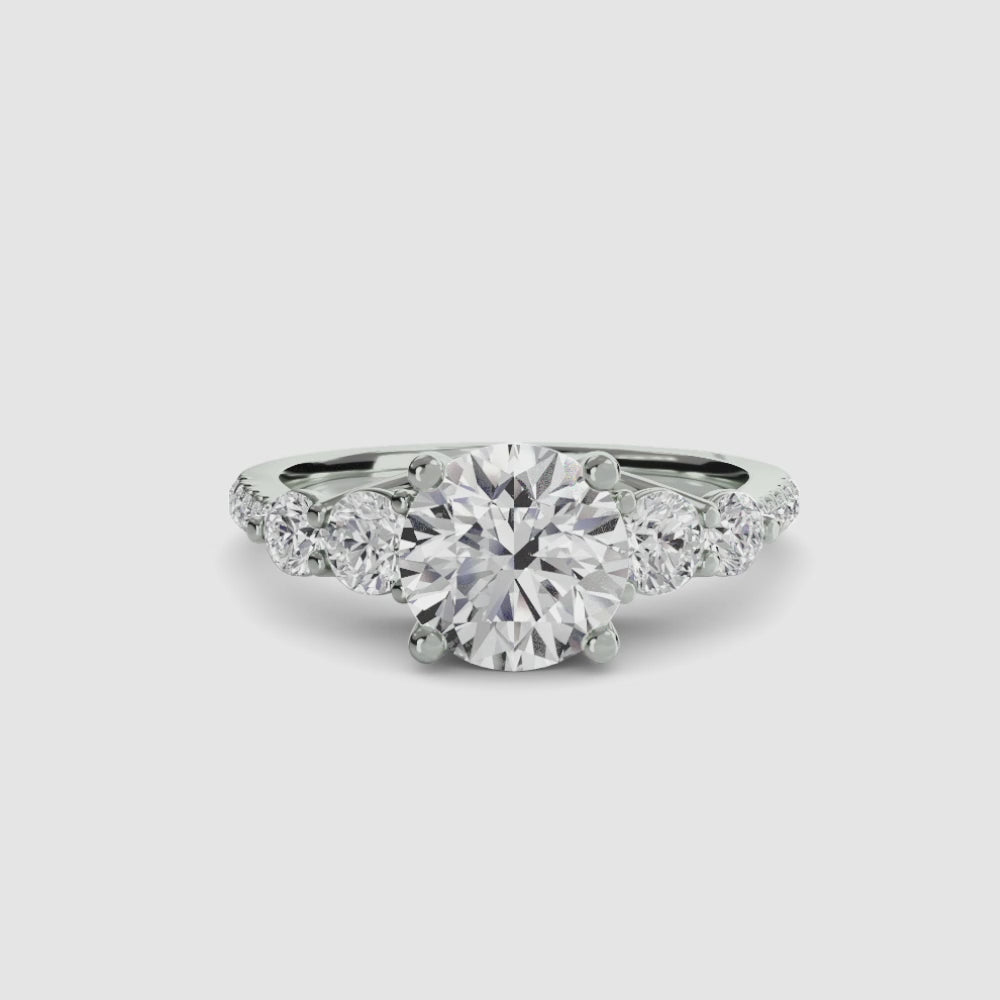 engagement-rings__five-stone-ring-with-pavé-band__shape-round__gold-white__00_video.mp4