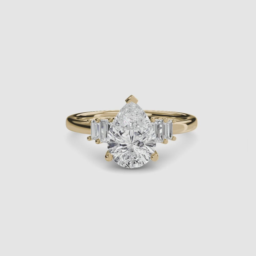 engagement-rings__baguette-accent-solitaire__shape-pear__gold-gold__00_video.mp4