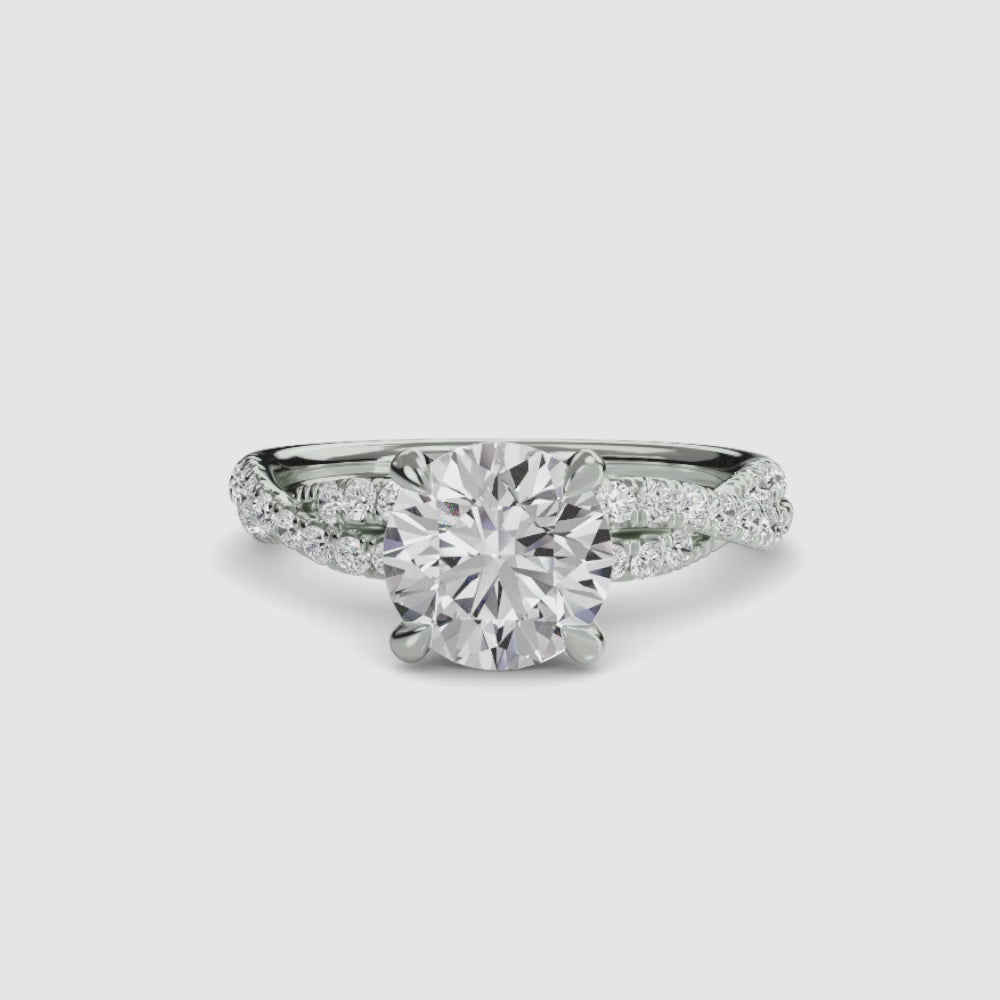 engagement-rings__the-twisted-pavé-solitaire__shape-round__gold-white__00_video.mp4