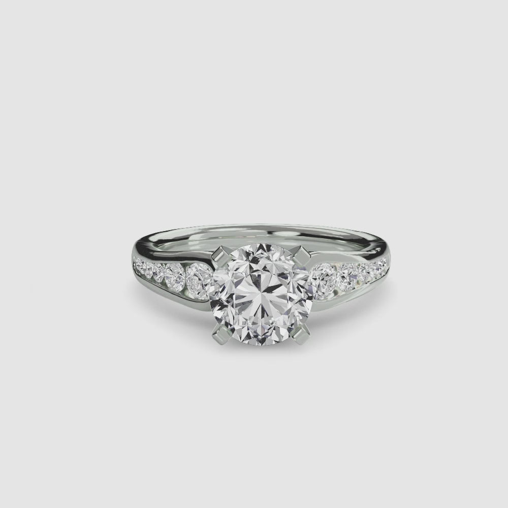 engagement-rings__solitaire-with-pavé-2__shape-round__gold-white__00_video.mp4